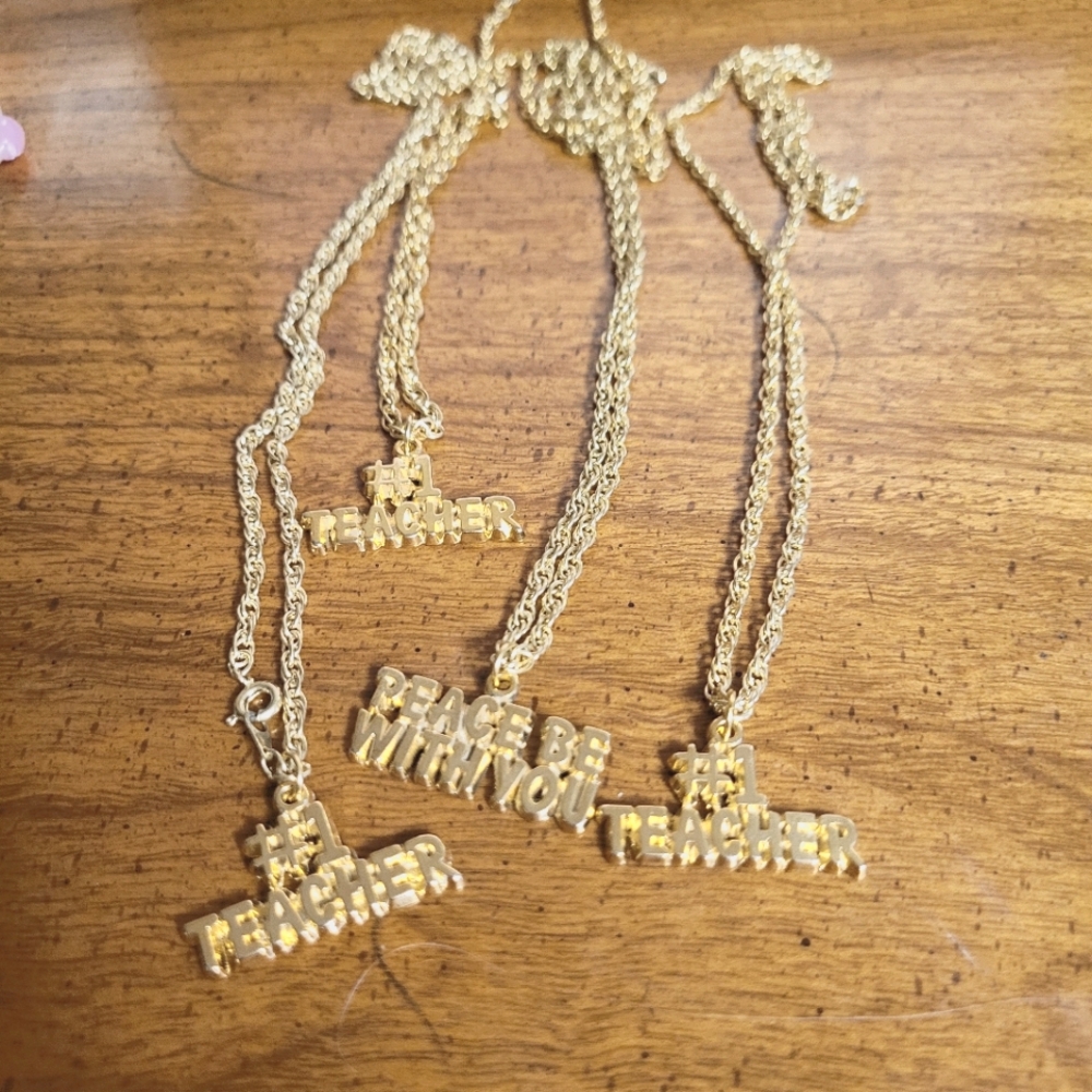 4 gold phrase necklaces